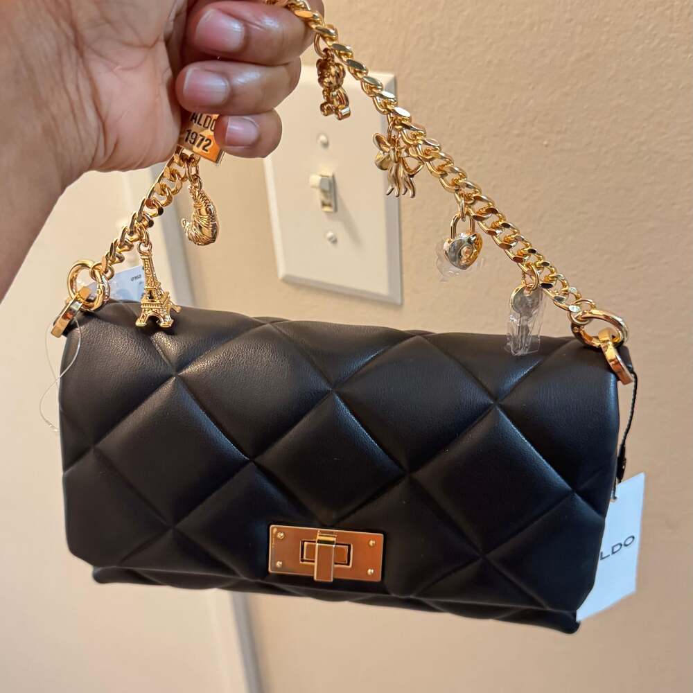 ALDO Lienna Black Quilted Crossbody Handbag with Gold-Tone Charm Chain Strap